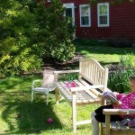 Child Reading in Garden